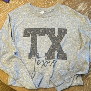 Gently Used Size Small Long Sleeve TX t-shirt cheetah print TX